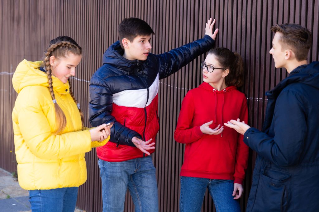 Teenage,Friends,Spending,Time,Together,In,City,Streets,In,Spring,